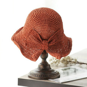 Składany kapelusz słomkowy z kokardą